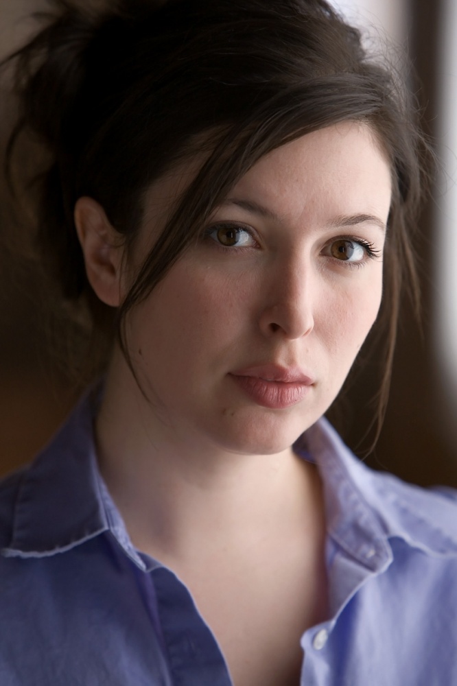 moody natural light headshot of actress