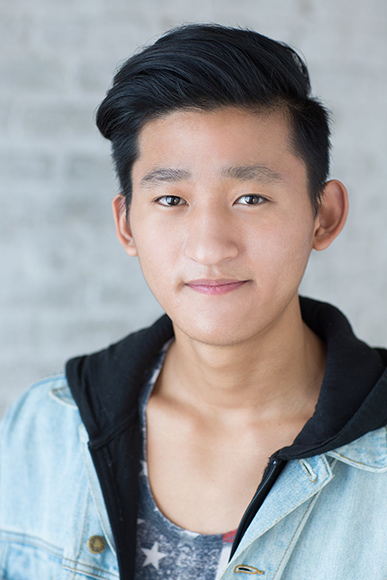 moody natural light headshot of actress